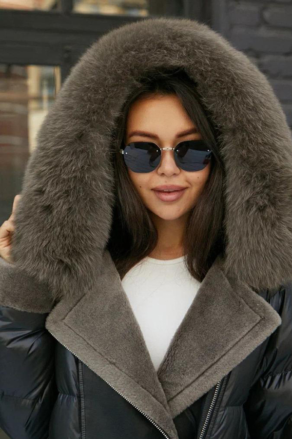 Стильный пуховик не приталенного кроя зима 2025